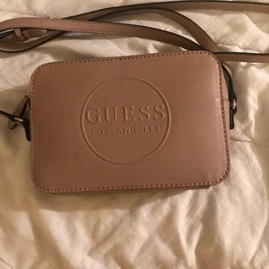 Guess crossbody bag like it was to small for everything I normally put in my bag